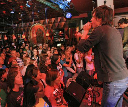 Band performing live at a Hard Rock Cafe
