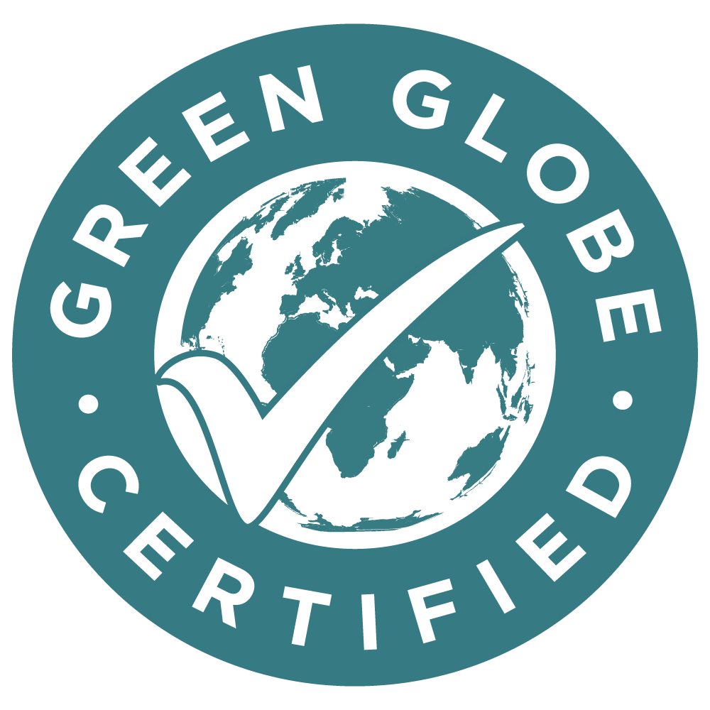 a green circle with a check mark and a globe