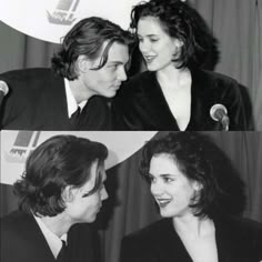 black and white photo of two people smiling at each other