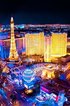 las vegas at night with the eiffel tower lit up