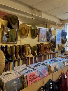 hats and cds are on display in a store