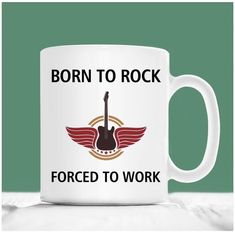 a white coffee mug with the words born to rock forced to work