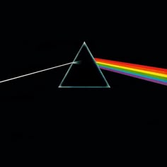 the dark side of the moon with a rainbow light coming from it's end