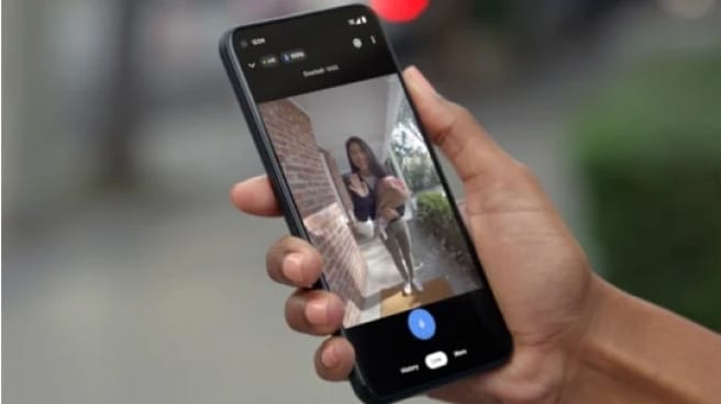 Side view showing Nest Doorbell (battery) being installed.